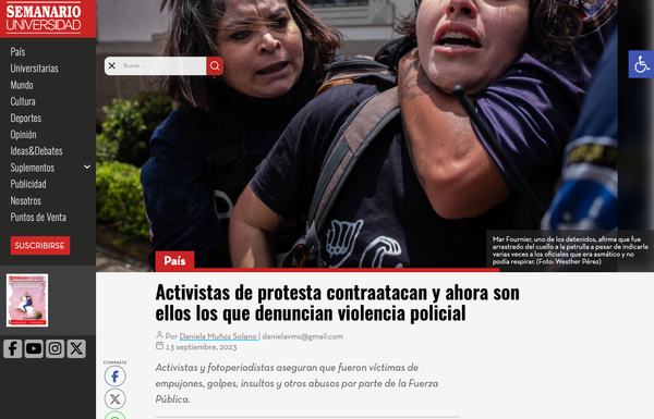 Police abuse activists at demonstration.